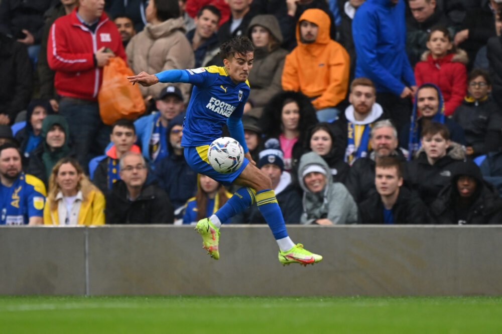 WIMBLEDON, UK. JAN 29TH Ayoub Assal of AFC Wimbledon celebrates after  scoring during the Sky Bet League 1 match between AFC Wimbledon and  Shrewsbury Town at Plough Lane, Wimbledon on Saturday 29th January 2022.  (Credit: Federico