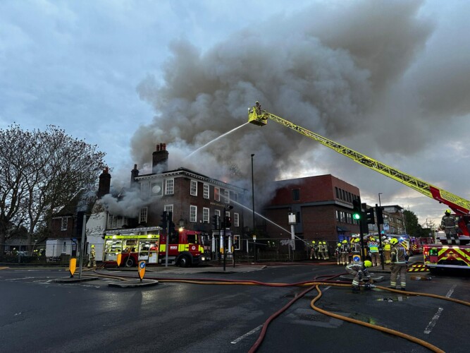 Four men assessed at scene after fire rips through Mitcham pub – South London News