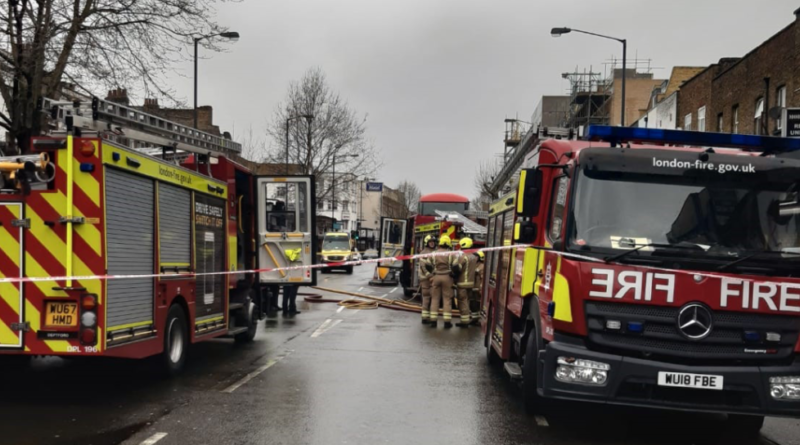 Woman treated by ambulance crews after flat fire – South London News