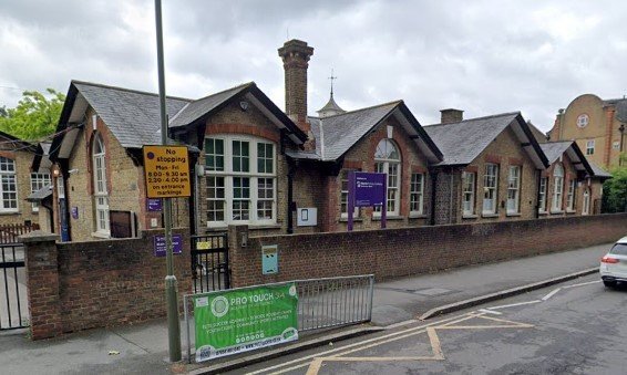 School where pupils read books to nursery children and care home ...